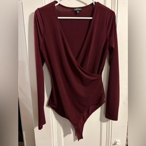 Maroon body suit.